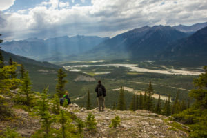 Rocky Mountains, hiker, valley with sunrays, Canada Rocky Mountains, hiker, valley with sunrays, Canada